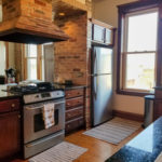 Rented with multiple applications! $1,700/mo 2BR/1BA in Logan Square with all the bells and whistles! Gourmet kitchen, exposed brick, stainless, DW, AC, in-unit laundry, hardwoods, MORE!
