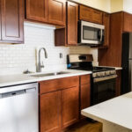 New listing! $1,275/mo 1BR/1BA in McKinley Park with all the bells and whistles! Stainless steel, dishwasher, AC, FREE parking, hardwoods, MORE!
